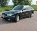 Черный Дэу Ланос, объемом двигателя 1.5 л и пробегом 280 тыс. км за 2050 $, фото 1 на Automoto.ua