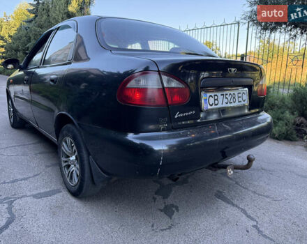 Черный Дэу Ланос, объемом двигателя 1.5 л и пробегом 200 тыс. км за 1450 $, фото 7 на Automoto.ua