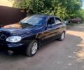 Чорний Деу Ланос, об'ємом двигуна 1.5 л та пробігом 120 тис. км за 2800 $, фото 1 на Automoto.ua