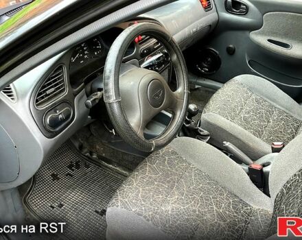 Дэу Ланос 2007 в Харькове на Automoto.ua Черный Дэу Ланос, объемом двигателя 1.5 л и пробегом 176 тыс. км за 3100 $, фото 4 на Automoto.ua