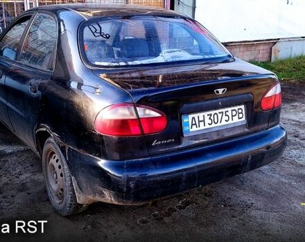Чорний Деу Ланос, об'ємом двигуна 1.5 л та пробігом 269 тис. км за 1300 $, фото 3 на Automoto.ua