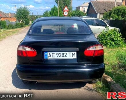 Черный Дэу Ланос, объемом двигателя 1.5 л и пробегом 255 тыс. км за 3200 $, фото 1 на Automoto.ua