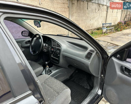 Черный Дэу Ланос, объемом двигателя 1.6 л и пробегом 140 тыс. км за 2700 $, фото 11 на Automoto.ua