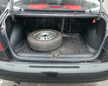 Черный Дэу Ланос, объемом двигателя 1.5 л и пробегом 224 тыс. км за 1499 $, фото 13 на Automoto.ua