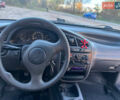 Деу Ланос 2007 у Черняхове на Automoto.ua Чорний Деу Ланос, об'ємом двигуна 1.5 л та пробігом 113 тис. км за 2700 $, фото 9 на Automoto.ua
