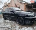 Чорний Деу Ланос, об'ємом двигуна 1.6 л та пробігом 63 тис. км за 4200 $, фото 1 на Automoto.ua