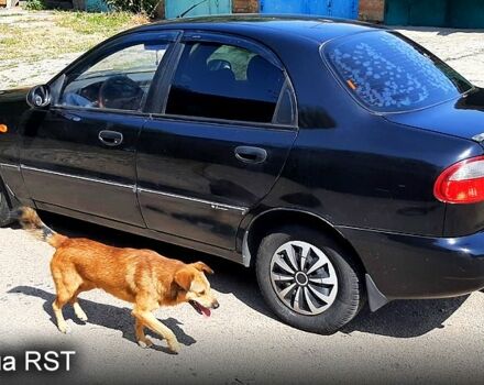 Черный Дэу Ланос, объемом двигателя 1.5 л и пробегом 200 тыс. км за 2350 $, фото 4 на Automoto.ua