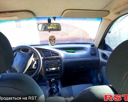 Черный Дэу Ланос, объемом двигателя 1.6 л и пробегом 380 тыс. км за 2300 $, фото 1 на Automoto.ua