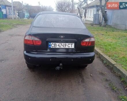 Черный Дэу Ланос, объемом двигателя 1.5 л и пробегом 230 тыс. км за 2350 $, фото 3 на Automoto.ua