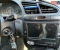 Черный Дэу Ланос, объемом двигателя 1.6 л и пробегом 154 тыс. км за 3500 $, фото 7 на Automoto.ua