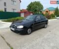 Чорний Деу Ланос, об'ємом двигуна 1.5 л та пробігом 138 тис. км за 1300 $, фото 1 на Automoto.ua