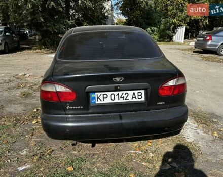 Черный Дэу Ланос, объемом двигателя 1.6 л и пробегом 154 тыс. км за 3500 $, фото 2 на Automoto.ua