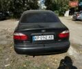 Черный Дэу Ланос, объемом двигателя 1.6 л и пробегом 154 тыс. км за 3500 $, фото 2 на Automoto.ua