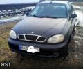 Чорний Деу Ланос, об'ємом двигуна 1.5 л та пробігом 225 тис. км за 1300 $, фото 1 на Automoto.ua