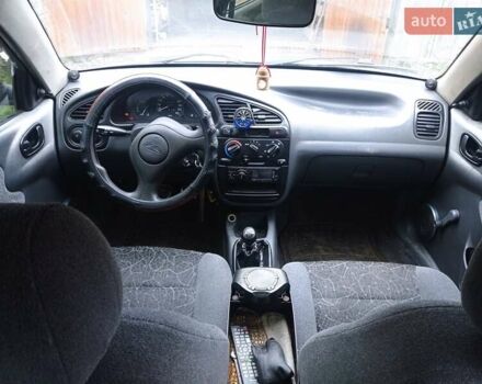 Черный Дэу Ланос, объемом двигателя 1.5 л и пробегом 141 тыс. км за 1700 $, фото 7 на Automoto.ua