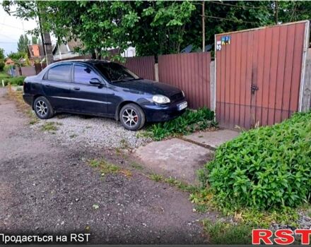 Чорний Деу Ланос, об'ємом двигуна 1.4 л та пробігом 222 тис. км за 2100 $, фото 11 на Automoto.ua