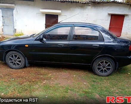 Черный Дэу Ланос, объемом двигателя 1.5 л и пробегом 337 тыс. км за 3000 $, фото 3 на Automoto.ua