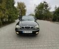 Чорний Деу Ланос, об'ємом двигуна 1.5 л та пробігом 307 тис. км за 1400 $, фото 1 на Automoto.ua