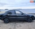 Черный Дэу Ланос, объемом двигателя 1.5 л и пробегом 289 тыс. км за 1700 $, фото 4 на Automoto.ua