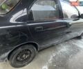 Черный Дэу Ланос, объемом двигателя 1.5 л и пробегом 235 тыс. км за 2000 $, фото 5 на Automoto.ua