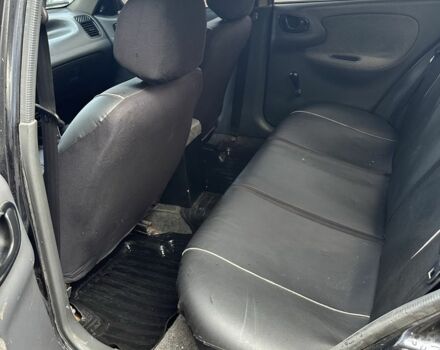 Черный Дэу Ланос, объемом двигателя 1.5 л и пробегом 150 тыс. км за 1700 $, фото 9 на Automoto.ua