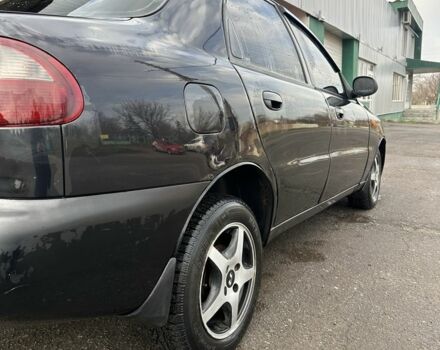 Черный Дэу Ланос, объемом двигателя 1.5 л и пробегом 150 тыс. км за 1700 $, фото 7 на Automoto.ua