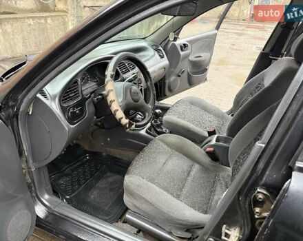 Черный Дэу Ланос, объемом двигателя 0 л и пробегом 150 тыс. км за 1250 $, фото 10 на Automoto.ua