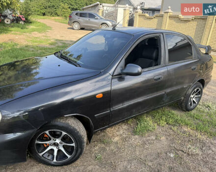 Черный Дэу Ланос, объемом двигателя 1.6 л и пробегом 275 тыс. км за 1700 $, фото 2 на Automoto.ua