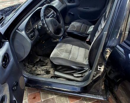 Черный Дэу Ланос, объемом двигателя 1.5 л и пробегом 177 тыс. км за 2200 $, фото 7 на Automoto.ua