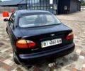 Черный Дэу Ланос, объемом двигателя 1.5 л и пробегом 177 тыс. км за 2200 $, фото 2 на Automoto.ua