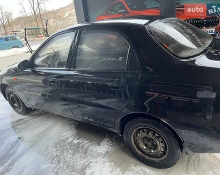Черный Дэу Ланос, объемом двигателя 1.5 л и пробегом 235 тыс. км за 2000 $, фото 2 на Automoto.ua