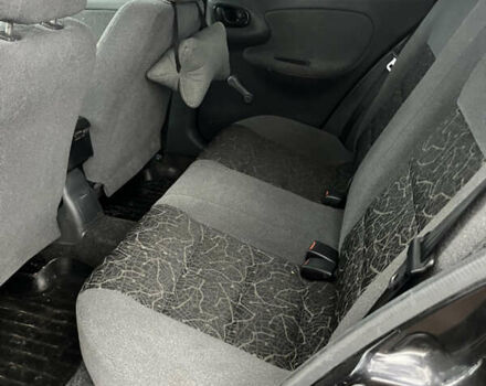 Черный Дэу Ланос, объемом двигателя 1.5 л и пробегом 201 тыс. км за 1000 $, фото 10 на Automoto.ua