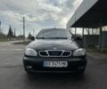 Черный Дэу Ланос, объемом двигателя 1.5 л и пробегом 150 тыс. км за 1700 $, фото 1 на Automoto.ua