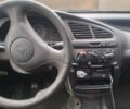 Черный Дэу Ланос, объемом двигателя 1.5 л и пробегом 235 тыс. км за 1300 $, фото 3 на Automoto.ua