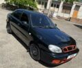 Чорний Деу Ланос, об'ємом двигуна 1.6 л та пробігом 185 тис. км за 2000 $, фото 1 на Automoto.ua
