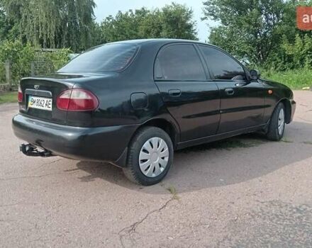 Черный Дэу Ланос, объемом двигателя 1.5 л и пробегом 280 тыс. км за 2050 $, фото 3 на Automoto.ua