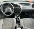 Черный Дэу Ланос, объемом двигателя 1.5 л и пробегом 105 тыс. км за 2450 $, фото 24 на Automoto.ua