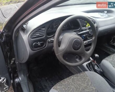 Черный Дэу Ланос, объемом двигателя 1.5 л и пробегом 230 тыс. км за 2350 $, фото 9 на Automoto.ua