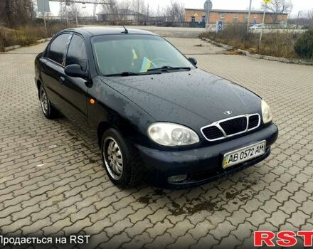Черный Дэу Ланос, объемом двигателя 1.6 л и пробегом 200 тыс. км за 1600 $, фото 2 на Automoto.ua