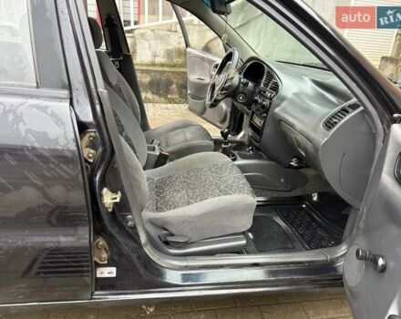 Черный Дэу Ланос, объемом двигателя 0 л и пробегом 150 тыс. км за 1250 $, фото 2 на Automoto.ua