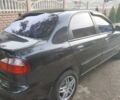Черный Дэу Ланос, объемом двигателя 1.5 л и пробегом 110 тыс. км за 2900 $, фото 5 на Automoto.ua