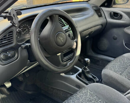 Чорний Деу Ланос, об'ємом двигуна 1.5 л та пробігом 253 тис. км за 2200 $, фото 4 на Automoto.ua