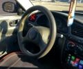 Черный Дэу Ланос, объемом двигателя 1.4 л и пробегом 152 тыс. км за 2550 $, фото 9 на Automoto.ua