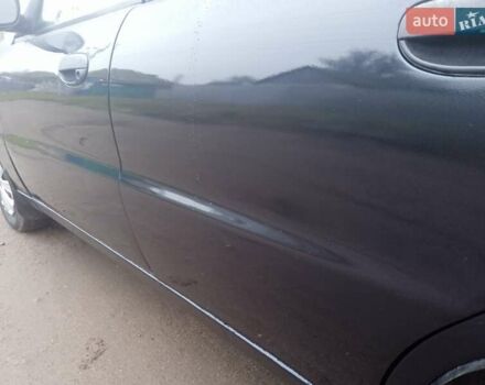 Черный Дэу Ланос, объемом двигателя 1.5 л и пробегом 230 тыс. км за 2350 $, фото 7 на Automoto.ua