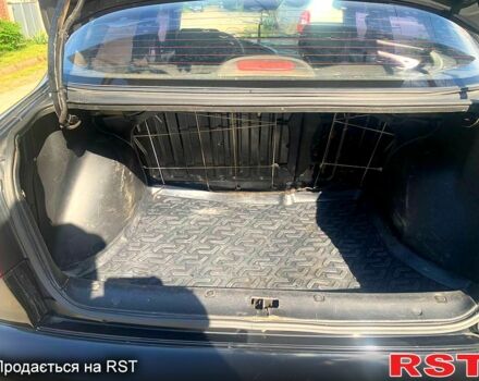 Черный Дэу Ланос, объемом двигателя 1.5 л и пробегом 255 тыс. км за 3200 $, фото 5 на Automoto.ua