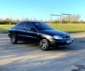 Черный Дэу Ланос, объемом двигателя 1.5 л и пробегом 150 тыс. км за 3100 $, фото 1 на Automoto.ua
