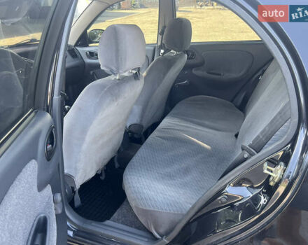Черный Дэу Ланос, объемом двигателя 1.5 л и пробегом 252 тыс. км за 2550 $, фото 10 на Automoto.ua