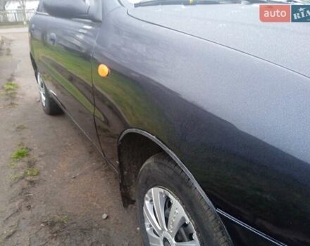 Черный Дэу Ланос, объемом двигателя 1.5 л и пробегом 230 тыс. км за 2350 $, фото 4 на Automoto.ua