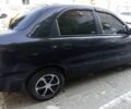 Черный Дэу Ланос, объемом двигателя 1.5 л и пробегом 350 тыс. км за 1400 $, фото 1 на Automoto.ua