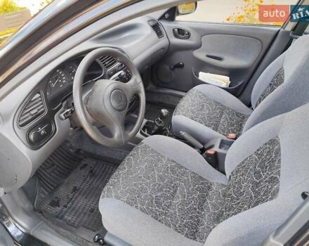 Черный Дэу Ланос, объемом двигателя 1.5 л и пробегом 81 тыс. км за 3800 $, фото 7 на Automoto.ua